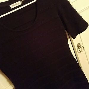 A black all cotton ribbed Calvin Klein dress